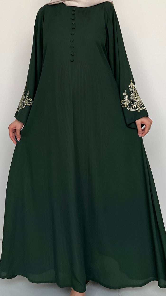 Green abaya with embroidered sleeves on a white background